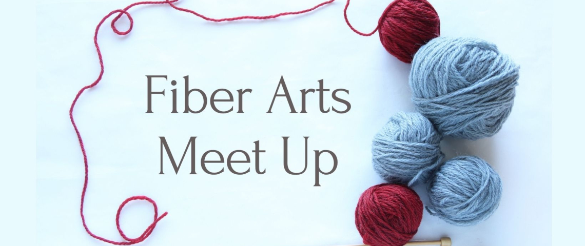Fiber arts meet up banner featuring blue and red yarn balls